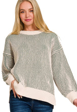 Load image into Gallery viewer, Woman wearing a striped sweater with a white background