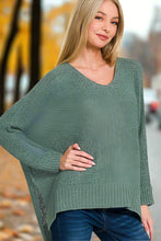 Load image into Gallery viewer, Woman wearing a green sweater with a plain background