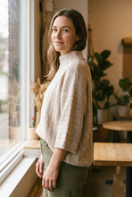 Load image into Gallery viewer, Closer side-angle view of the Softly Yours sweater