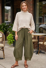 Load image into Gallery viewer, Front-tucked oatmeal sweater with wide three-quarter sleeves and olive lace pants