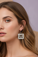 Load image into Gallery viewer, Woman wearing silver textured double square drop earrings, boho coastal lifestyle