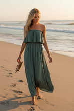 Load image into Gallery viewer, Woven Crinkle Strapless Maxi Dress in dusty sage green worn on the beach at golden hour