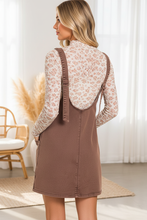 Load image into Gallery viewer, Mahogany Overall Dress styled with floral mesh top - back