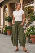 Load image into Gallery viewer, Olive lace pants styled outside a café