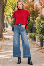 Load image into Gallery viewer, Ruby sweater layered over black lace mesh with pintuck jeans and black boots