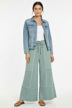 Load image into Gallery viewer, Sage green pants, white tank, and jean jacket