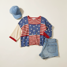 Load image into Gallery viewer, USA Patchwork Summer Sweater flat lay with denim shorts and denim cap