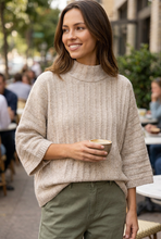 Load image into Gallery viewer, Waist-up coffee-stop view of the Softly Yours sweater